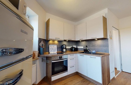 Wangerooge Apartment | Ferienwohnung Gustav - Moderne Maisonette-wohnung mit Terrasse