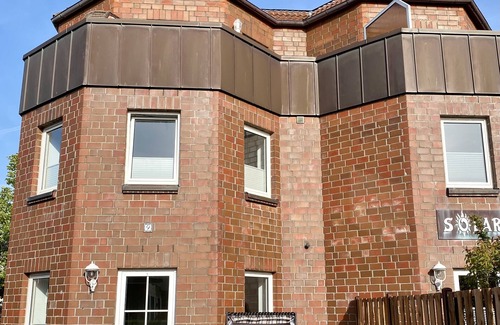 Wangerooge Apartment | Ferienwohnung Gustav - Moderne Maisonette-wohnung mit Terrasse
