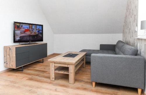 Neuharlingersiel Apartment | Ferienwohnung im Haus Hafenlicht