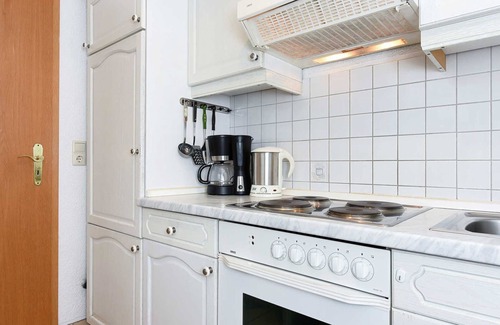 Dunum Apartment | Ferienwohnung Löwenzahn - Ferienwohnungen Kornblume und Löwenzahn im Haus Sassenhof