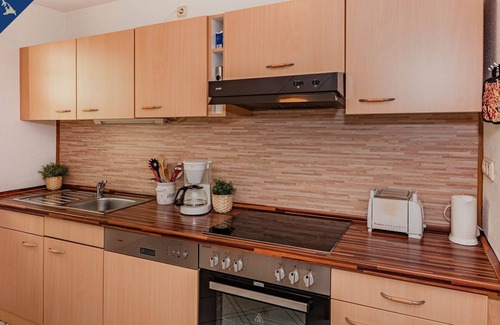 Korswandt Apartment | Ferienwohnung Waldhaus 4.2 - Gemütlicher Ferienbungalow in Ruhiger Waldrandlage, 800 m vom