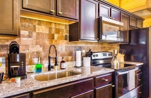 Sevierville Cabin | Festive Getaway! Fall Foliage Hot Tub + 2 Suites, Dog Ok & Close to everything!