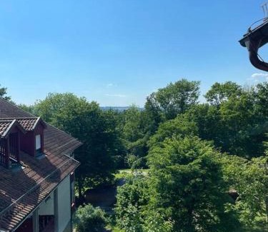 Bad Griesbach-Therme Apartment | FeWo 57 - Appartement im Rottalblick - Helle Kuschelecke genießen mit Bademantelgang zur Therme, TV, inkl Stellplatz im Haus u Kurtaxe