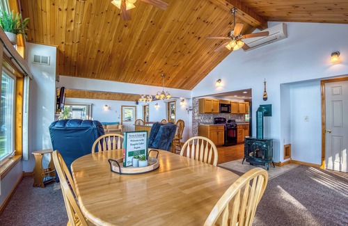 Rangeley House | Fielding Lakehouse - Spacious home with nice grass area leading to Rangeley Lake
