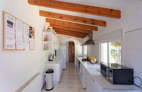 Pinar del Advocat Villa | Fiesta~Siesta in this easy to access Moraira home with unique bedrooms and BBQ