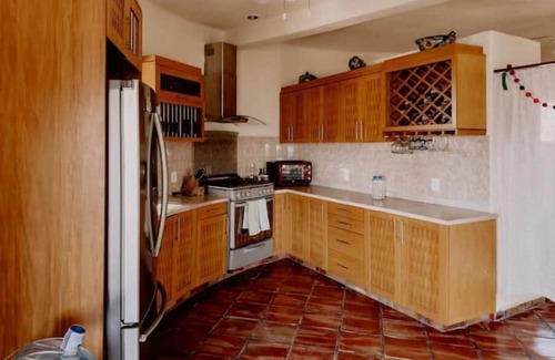 Compostela House | Find tranquility and escape tourism in this hillside home close to beaches