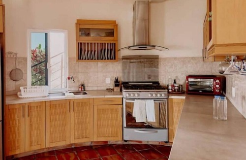 Compostela House | Find tranquility and escape tourism in this hillside home close to beaches