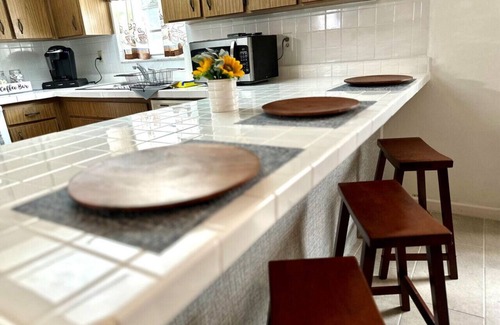Tampa Heights Apartment | Fire Pit Fenced Backyard Board Games