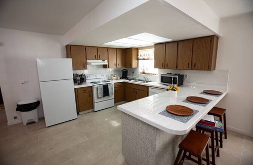 Tampa Heights Apartment | Fire Pit Fenced Backyard Board Games