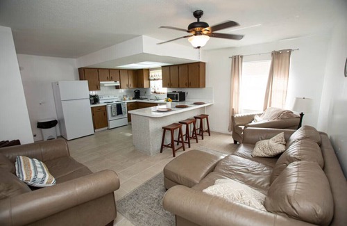Tampa Heights Apartment | Fire Pit Fenced Backyard Board Games