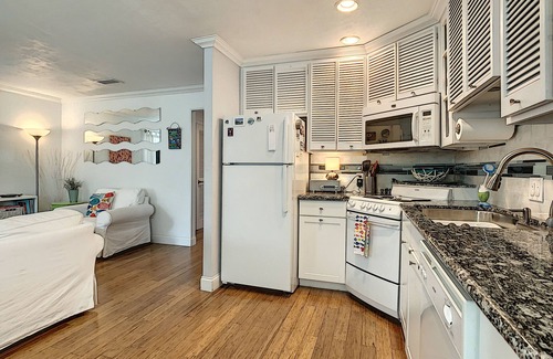 New Smyrna Beach Condo | Fish Cottage ~ NSB Sanctuary! Pool & Courtyard View | Coronado Arms B11