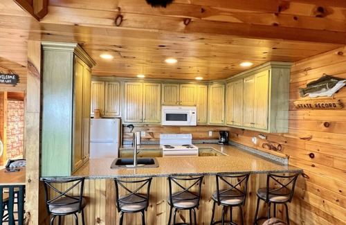 Bryant Cabin | FISH TALES · NO SUNDAY CHECK-INS ,VIEW HOT-TUB FISH TALES