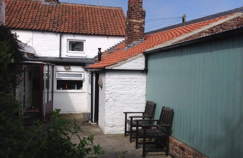 Flamborough Cottage | Flamborough Cottage large private garden parking, pets welcome. Wifi .