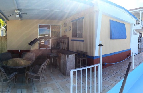 Tavernier House | Florida Keys charming canal front bungalow with boat dock included