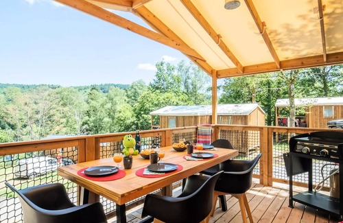Treignac House | Flower Camping La Plage * - Mobile home Standard 27 m2 (2 bedrooms) + TV with an integrated terrace semi-covered 7m2 4 people
