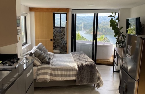 Guatape Apartment | FOR TWO PEOPLE LAKE VIEW JACUZZI INSIDE AND OUTSIDE