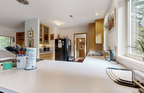Manzanita House | Forest-view home w/fireplace, deck - Walk to the Beach & Golf Course