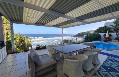 Shaka's Rock House | Four Bedroom Main plus 2 Bedroom Cottage Ballito Beachfront KTL1