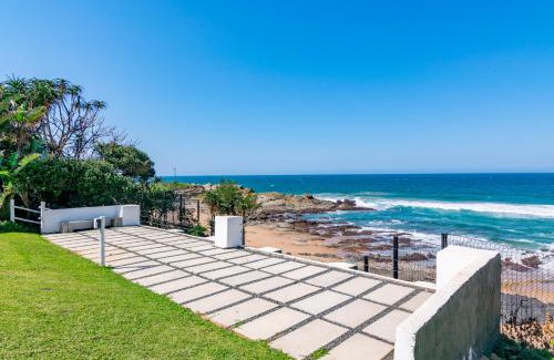 Shaka's Rock House | Four Bedroom Main plus 2 Bedroom Cottage Ballito Beachfront KTL1