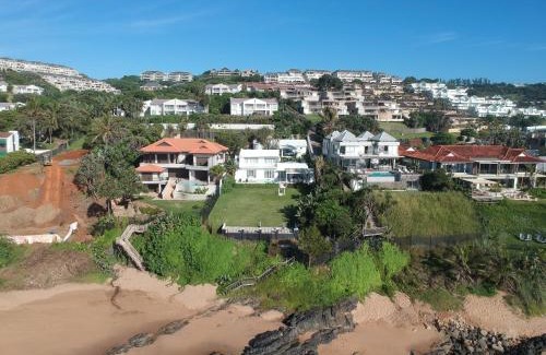 Shaka's Rock House | Four Bedroom Main plus 2 Bedroom Cottage Ballito Beachfront KTL1