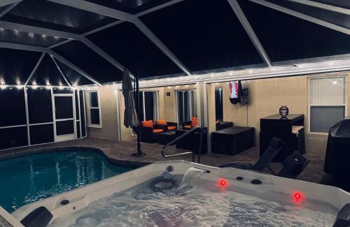 Pelican House | Four Bedrooms Oasis with Heated Pool Private Jacuzzi and Billiards