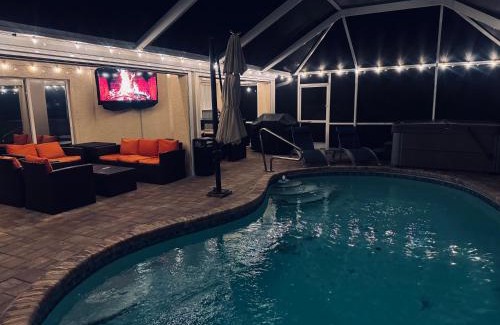 Pelican House | Four Bedrooms Oasis with Heated Pool Private Jacuzzi and Billiards