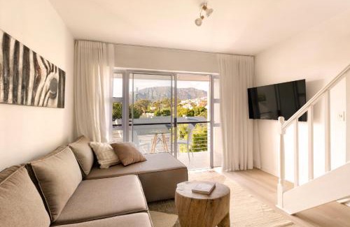 Hout Bay Apartment | Four Peaks Duplex - 4 Sleeper with Mountain Views, Balcony and Pool in Hout Bay Beachfront