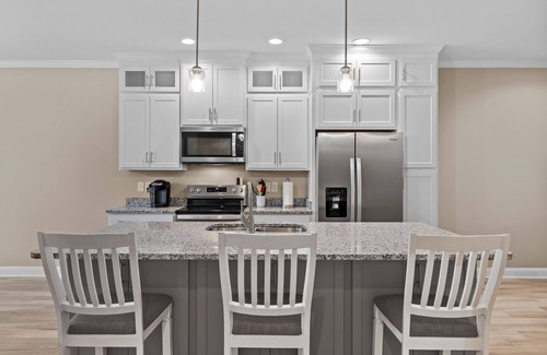 Morehead City House | Four townhomes - heart of the city - elevator, balconies, fast WiFi, central AC