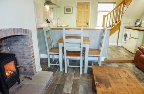 Millington Cottage | FRAN'S COTTAGE, with open fire in Millington