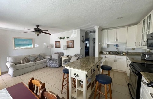 Discovery Bay Condo | Freeport Grand Bahamas: Coral Beach Family Friendly Condo- steps to the beach!