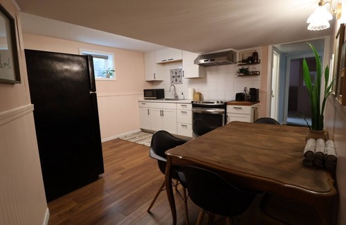 West Bench Apartment | French Cottage Inspired Basement Apartment 15 From Downtown Boise