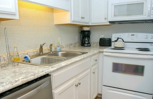 Thomas Drive Condo | Freshly updated beachfront condo with stunning views. Sleeps 4. Onsite Pool.