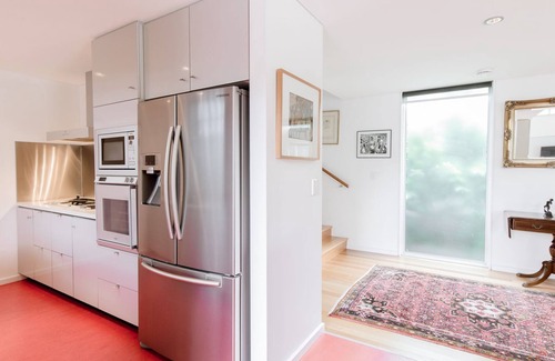 Noosa Heads House | Frida - Elysium. enjoys lush streetscape and a natural bush backdrop.