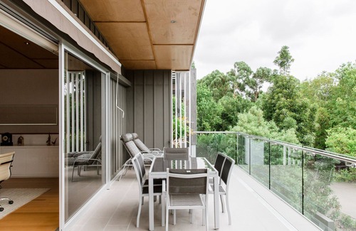 Noosa Heads House | Frida - Elysium. enjoys lush streetscape and a natural bush backdrop.