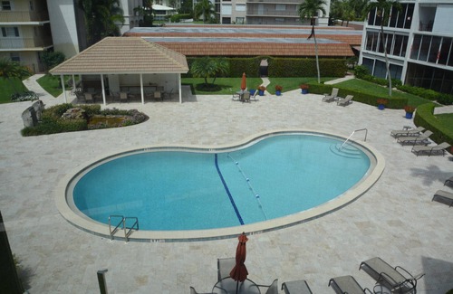 Moorings Condo | Front unit overlooking Moorings bay - 7 min walk to the Beach. 2 boat slips