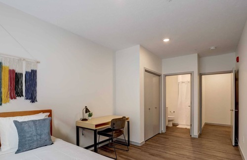 Downtown Lincoln Apartment | Frontdesk | 4 BR Apt by Nebraska History Museum