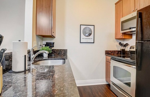 Cole-Noble District Apartment | Frontdesk | Studio Apt by Indiana War Memorial