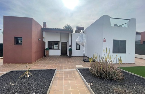 Caleta de Fuste Villa | Frontline villa with private pool on La Estancia, Calle Lago Mayor