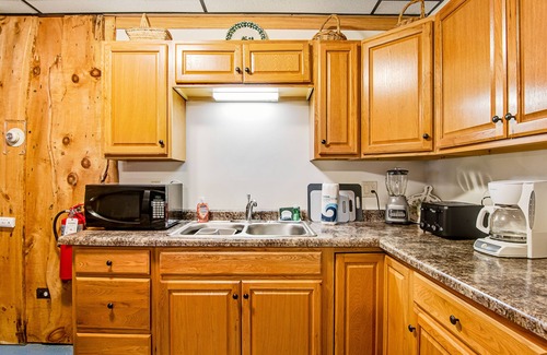 Presque Isle Cabin | Full hotel with bar, commercial kitchen, pool table & fireplaces - dog-friendly