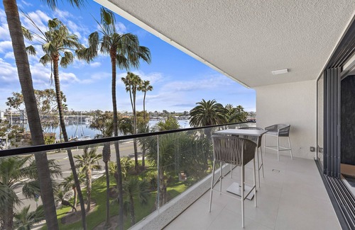 Balboa Peninsula Condo | Fully Furnished Executive Condo-Ocean Views, steps to Lido Village and the beach