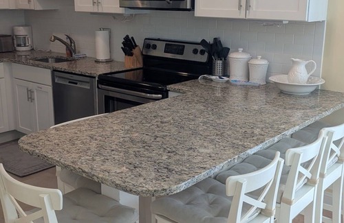 Stone Harbor Condo | FULLY RENOVATED! PRIVATE DECK AND POOL VIEW! STONE HARBOR GARDENS