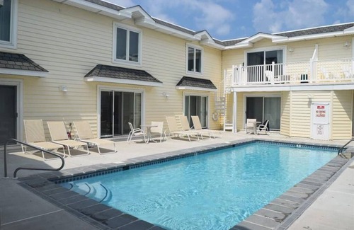 Stone Harbor Condo | FULLY RENOVATED! PRIVATE DECK AND POOL VIEW! STONE HARBOR GARDENS