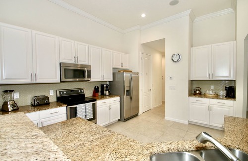 Loughman Villa | FUNTASTIC 1 LEVEL 5/4 POOL HOME- NATURE VIEW-NEAR DISNEY-FREE RESORT