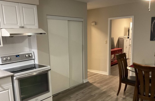 London Apartment | Furnished inclusive 1 bed + large den parking laundry patio suitcase ready