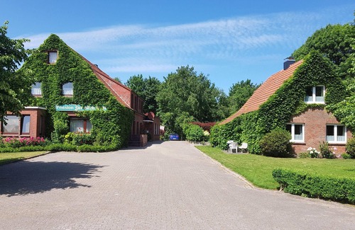 Dornumergrode Apartment | Gästehaus Zur alten Post Wohnung Ost