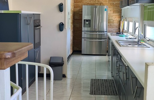 Petit-Bourg Villa | GÎTE KUMQUAT, T4 floor 3 bedrooms, mountain view, swimming pool