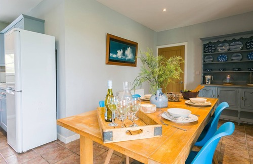 Bryngwran Cottage | Gamekeeper's - a hot tub that sleeps 4 guests in 2 bedrooms