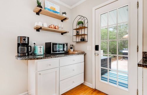 Santa Rosa Beach Cottage | Garden cottage close to beach with screened porch, WiFi, and central AC