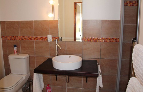 Hunter's Home Ski Chalet | Garden house with pool in a quiet location in Knysna