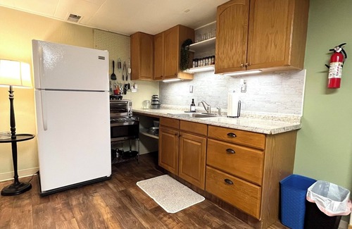 Greeley Apartment | Garden level 1-bedroom apartment, private entrance. Month-to-month.